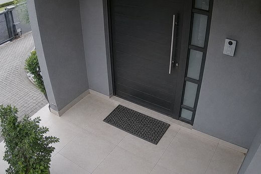 Front door and intercom under camera